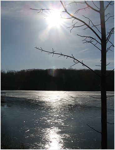 Receding ice on lake.