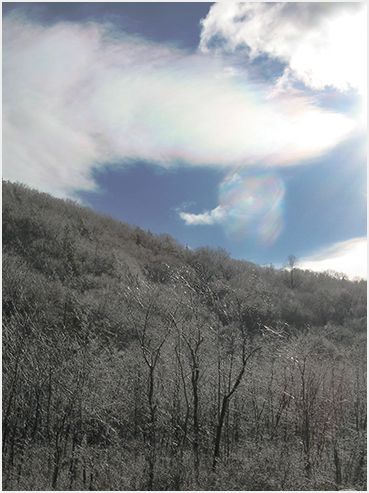 Iridescent clouds, ice.