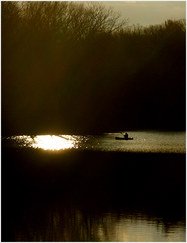 Canoe on lake.